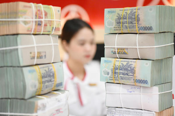 Doanh số giao dịch liên ngân hàng bằng VND bình quân vượt 936.000 tỷ đồng/ngày