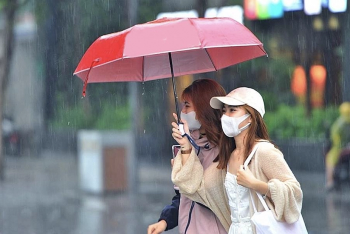 Miền Bắc nhiệt độ giảm nhanh, mưa phùn trên diện rộng.