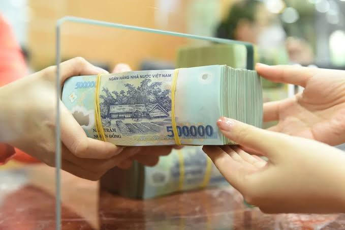 Phó Thủ tướng chỉ đạo triển khai giải pháp giảm mặt bằng lãi suất. (Ảnh minh họa)